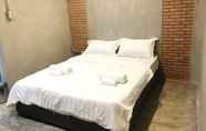 Kamar Tidur 2 Chartame Boutique Hotel