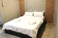 Kamar Tidur Chartame Boutique Hotel