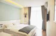 Kamar Tidur 2 Shinhua Hotel