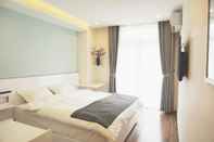 Bedroom Shinhua Hotel
