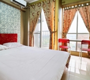 Bedroom 7 Snowy @ Apartemen Tifolia