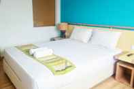 Bedroom Santosa City Hotel 