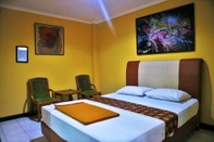 Kamar Tidur Hotel Syariah Wisma Nendra