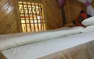 Kamar Tidur 3 Bac Ha Ethnic Homestay