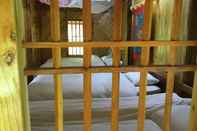 Phòng ngủ Bac Ha Ethnic Homestay