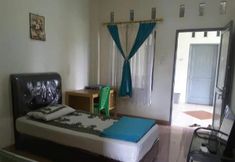 寝室 6 Penginapan Syariah