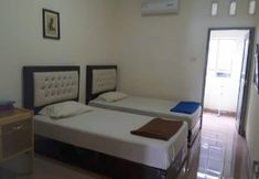 寝室 5 Penginapan Syariah