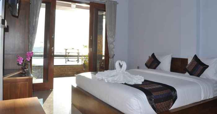 ห้องนอน Pradana Beach Inn 