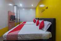 Kamar Tidur OYO 880 Hotel Purple Town