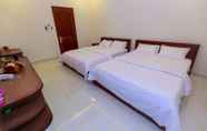 Phòng ngủ 4 Van Loc Hotel