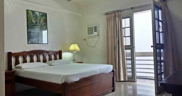 Kamar Tidur Casa Micarosa Hotel and Residences