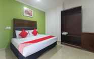 Kamar Tidur 5 SUPER OYO 805 Hotel Run Star