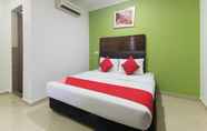 Kamar Tidur 2 SUPER OYO 805 Hotel Run Star