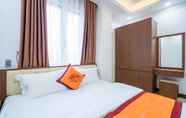 Kamar Tidur 4 Dinh Gia Hotel Ha Giang