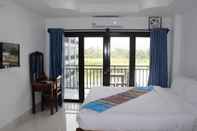 Kamar Tidur The Grand Riverside Hotel 2 Vangvieng