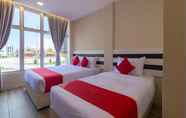 Bilik Tidur 2 SUPER OYO 1145 Lea Guest House & Cafe