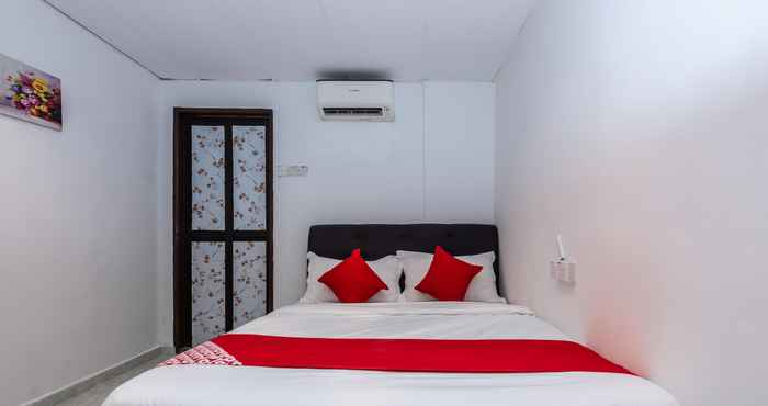 Bilik Tidur OYO 1132 Azimaju Guesthouse