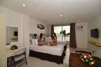 Kamar Tidur Holiday Oceanview Residences and Resort