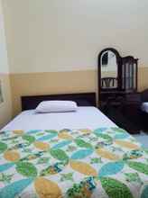 Kamar Tidur 4 Roots Hotel