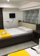 BEDROOM Cosmo Hotel & Studio Suites - P.Campa very near UST