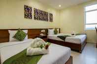 Kamar Tidur Rose Emerald Hotel