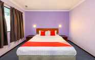 Bilik Tidur 3 SUPER OYO 472 Comfort Hotel 1