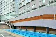 Swimming Pool Affordable Room at Apartment Suhat Malang by RIO