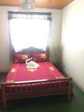 Kamar Tidur 4 Beachview Pink Lodge