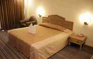 Bedroom 3 Grand Royal Plaza Hotel