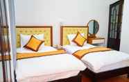 Phòng ngủ 4 Hoang Dinh Hotel Hue