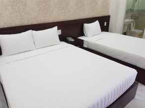 Kamar Tidur 4 SuMi Hotel