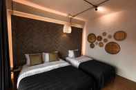 ห้องนอน The Brown Hotel Krabi