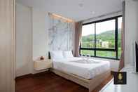 ห้องนอน The Lago Naiharn Phuket By Sala Estate 