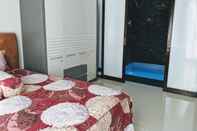 Kamar Tidur Villa Pinus F14 with Jacuzzi