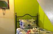 Kamar Tidur 2 Madie's Place Bed & Breakfast