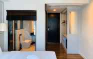 Kamar Tidur 6 The Wing Boutique Hotel