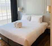 Kamar Tidur 7 The Wing Boutique Hotel