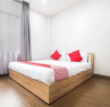 Kamar Tidur 2 OYO 253 J2 Travellers Inn