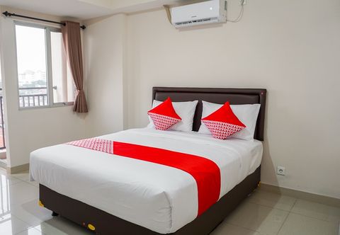 침실 Sudirman Suites