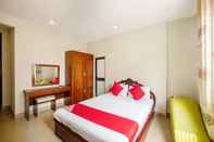 Phòng ngủ Van Thanh Dat Hotel