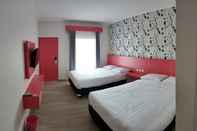 Phòng ngủ Oasis Style Hotel Pangandaran