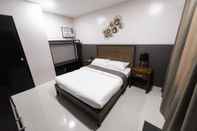 Kamar Tidur Bumble V Hotel Subic