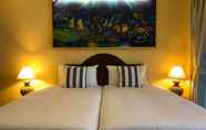 Phòng ngủ 2 Ginis Beach Resort