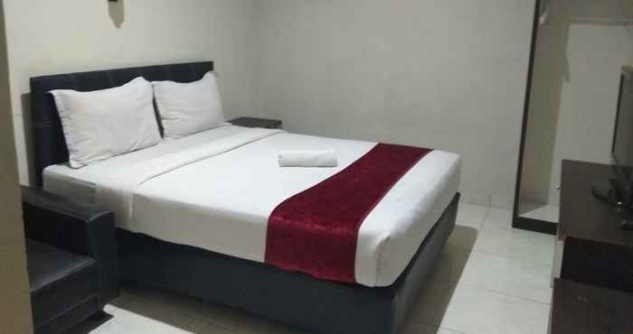 Kamar Tidur OYO 2991 Satya Homestay