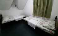 Kamar Tidur 7 Masinlo Guest House