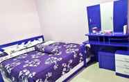 ห้องนอน 2 Purple Lombok Guest House