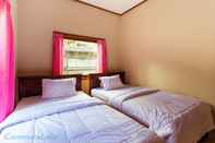 Bedroom Desa Wisata Sibetan Homestay by ecommerceloka