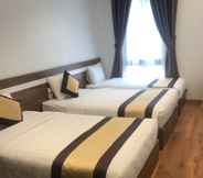 ห้องนอน 6 Tung Luxury Hotel