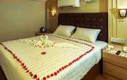 Kamar Tidur 4 White House Hotel