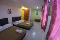 Kamar Tidur OYO 90324 Muar Station Hotel